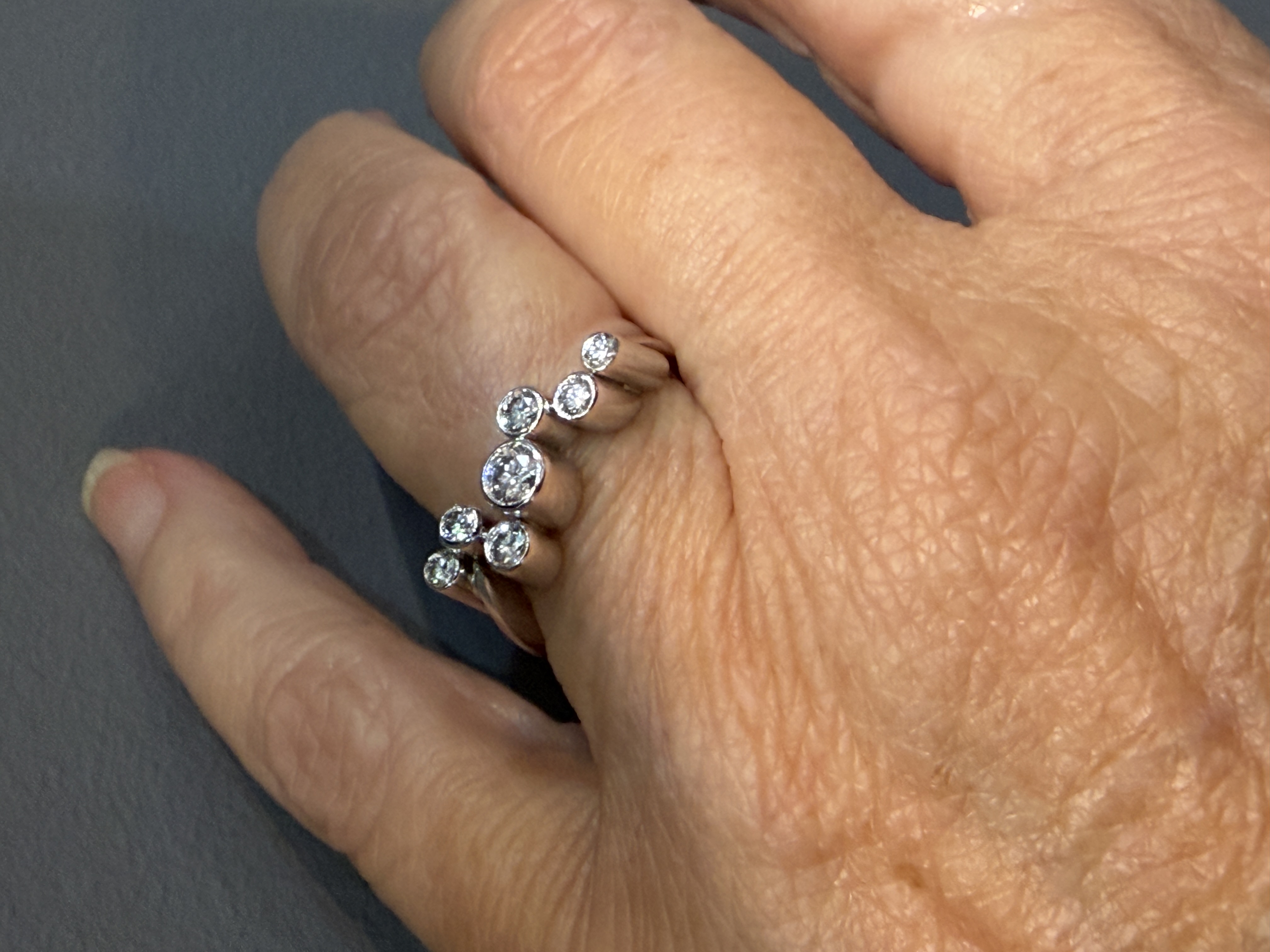 Discover the White Gold Cascade Diamond Ring by Georg Jensen at Grasilver. A luxurious design with stunning diamonds, perfect for adding elegance to any look.