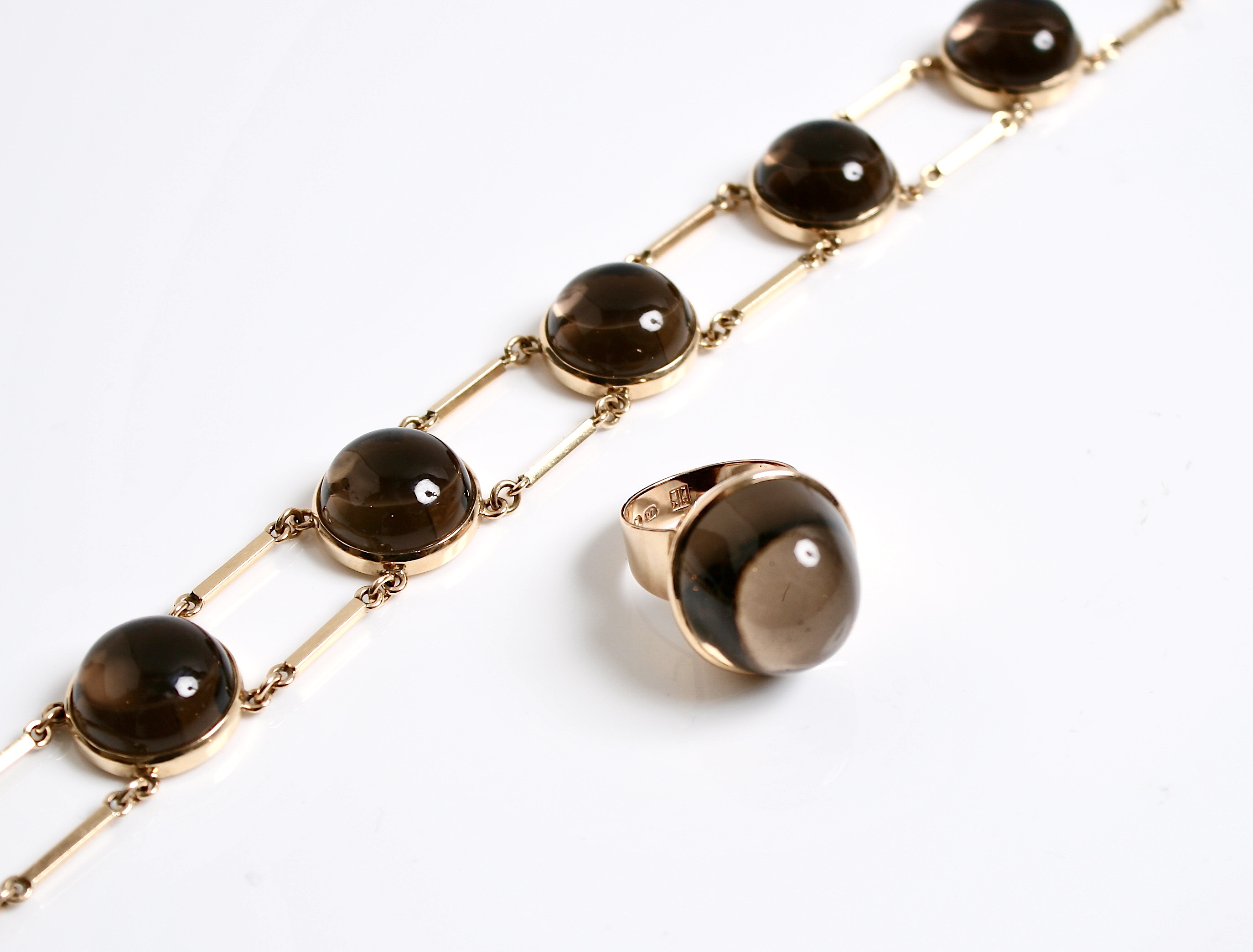 14k-gold-&-smokey-Quartz-"Pools-of-Light"-ring-designed-by-Kaunis-Koru-Finland 