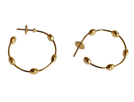 Shop the exquisite Georg Jensen 18K Gold Hoop Earrings. Crafted from high-quality gold, these earrings offer a perfect blend of sophistication and style, ideal for any occasion. Elevate your jewelry collection with this timeless accessory.