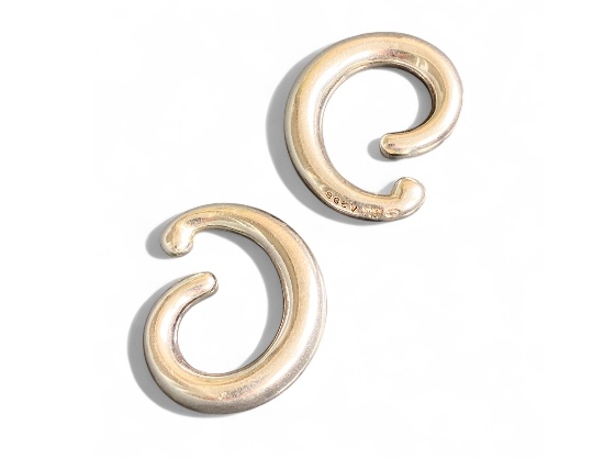 Discover the exquisite Georg Jensen ear cuffs, designed to elevate your style with a perfect blend of elegance and modernity. Shop now for a unique addition to your jewelry collection.