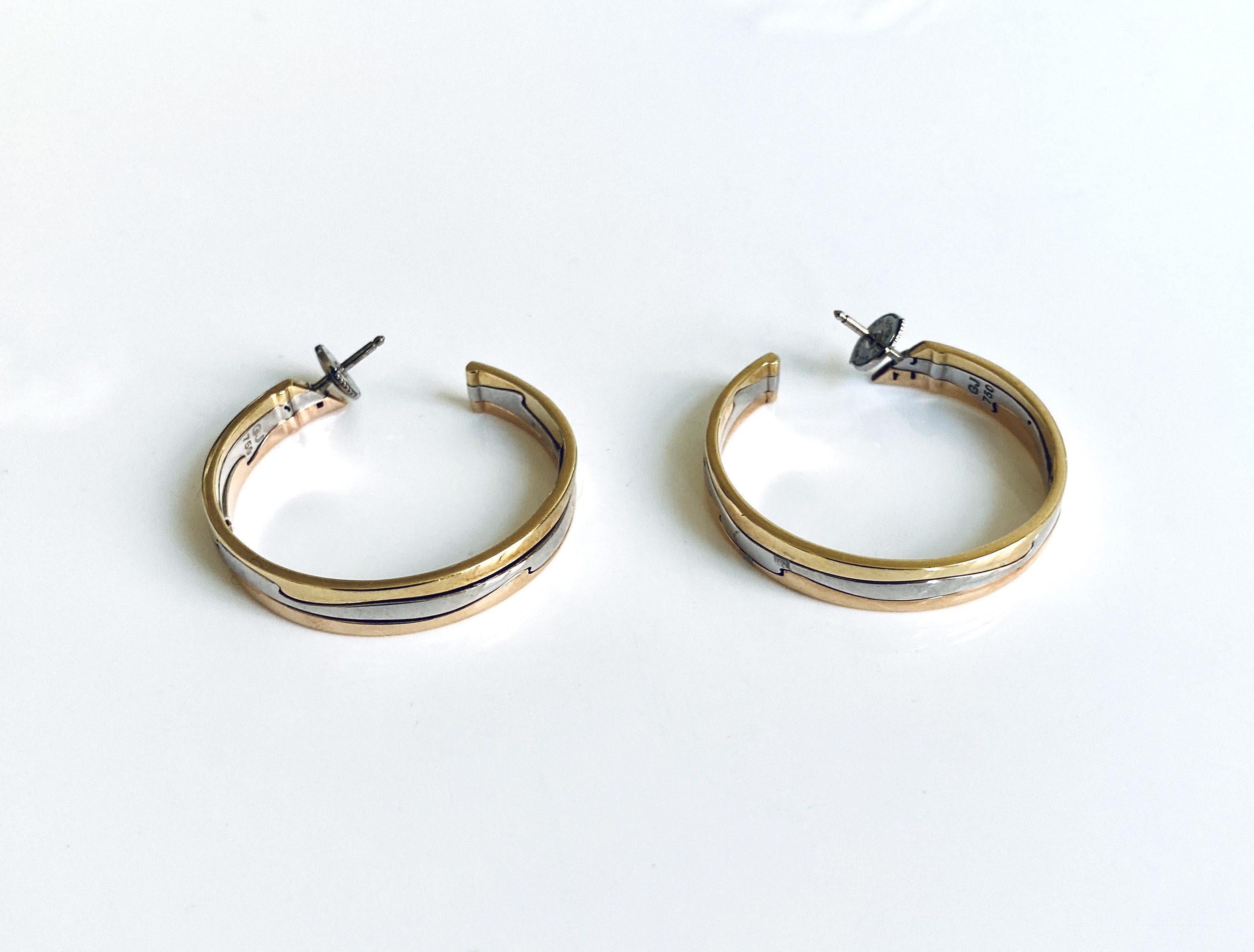 Discover the exquisite Georg Jensen Gold Fusion Hoop Earrings, a perfect blend of modern sophistication and classic elegance. Elevate your jewelry collection with these stunning earrings, crafted to shine on any occasion.