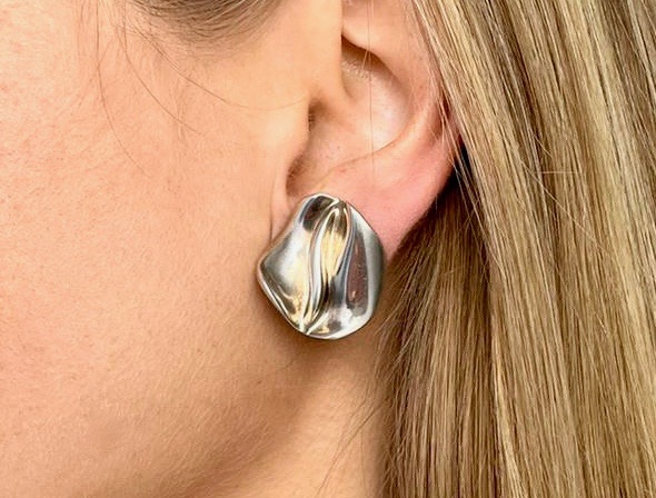 Discover the exquisite Georg Jensen Silver Clip Earrings, featuring a sophisticated design that embodies elegance and craftsmanship. Perfect for any occasion, these earrings add a touch of luxury to your style. Shop now!